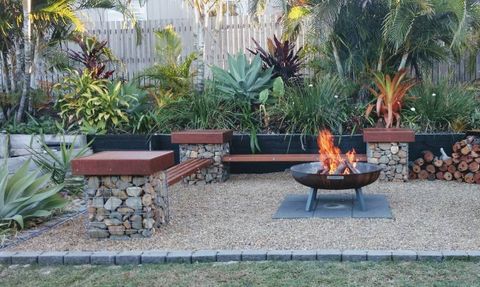 Fire pit stone seating — Landscaping Supplies in Gladstone, QLD
