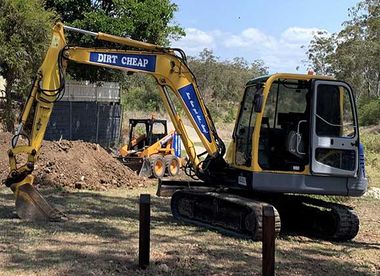 Yellow Excavator — Landscaping Supplies in Gladstone, QLD