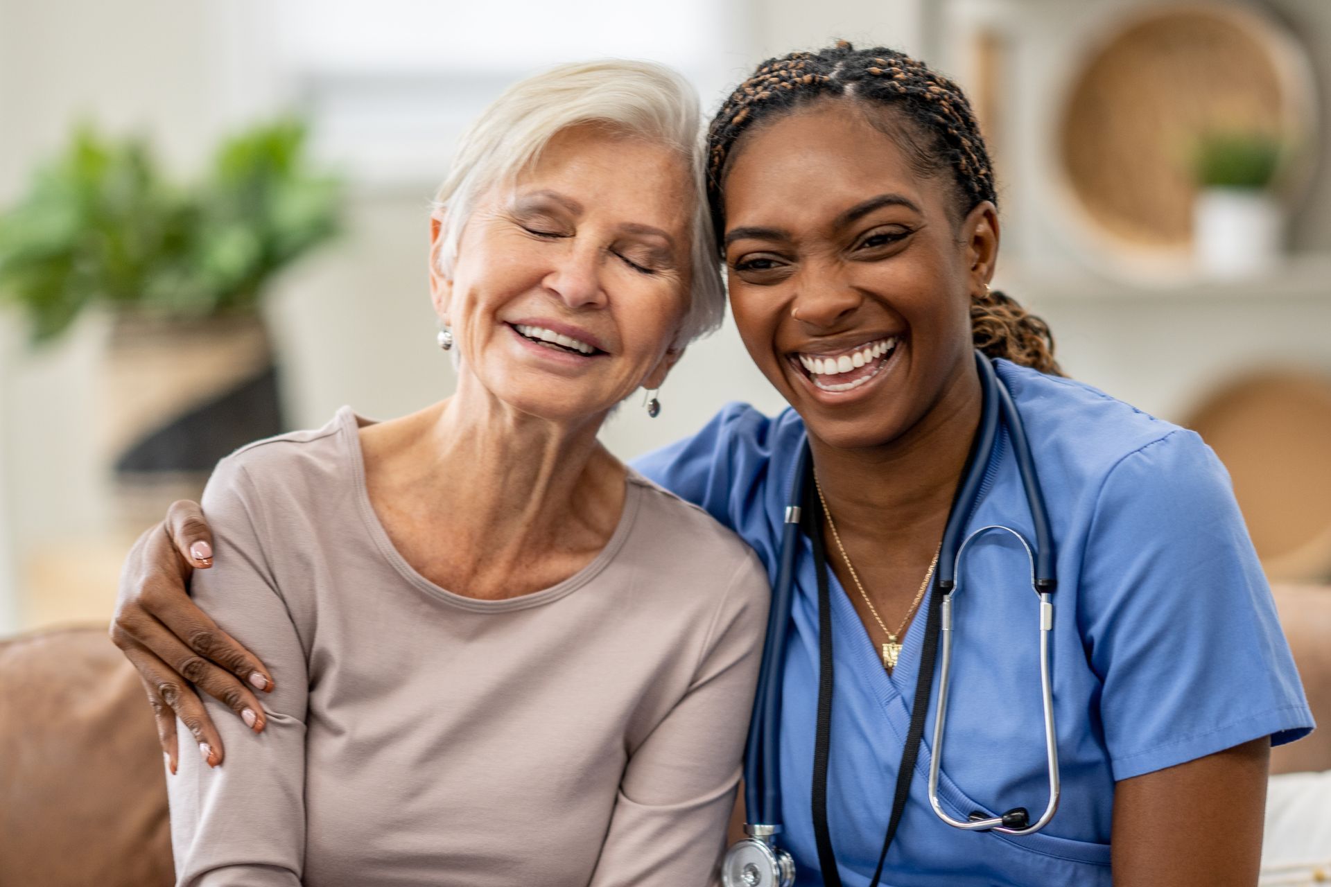 Nurse Providing At-Home Care to Elderly Patient - Home Nursing Care Service