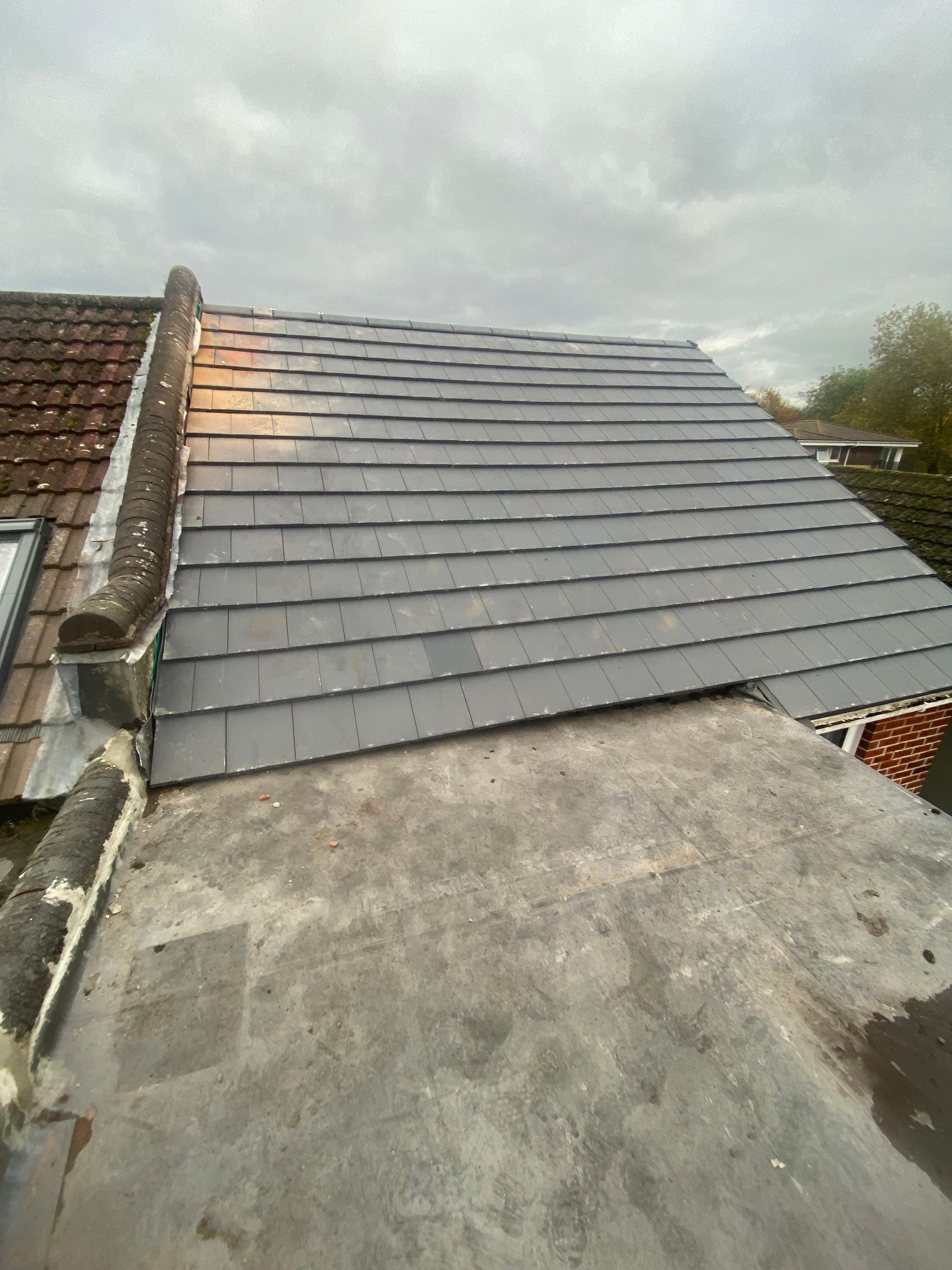 A roof with a lot of tiles on it.