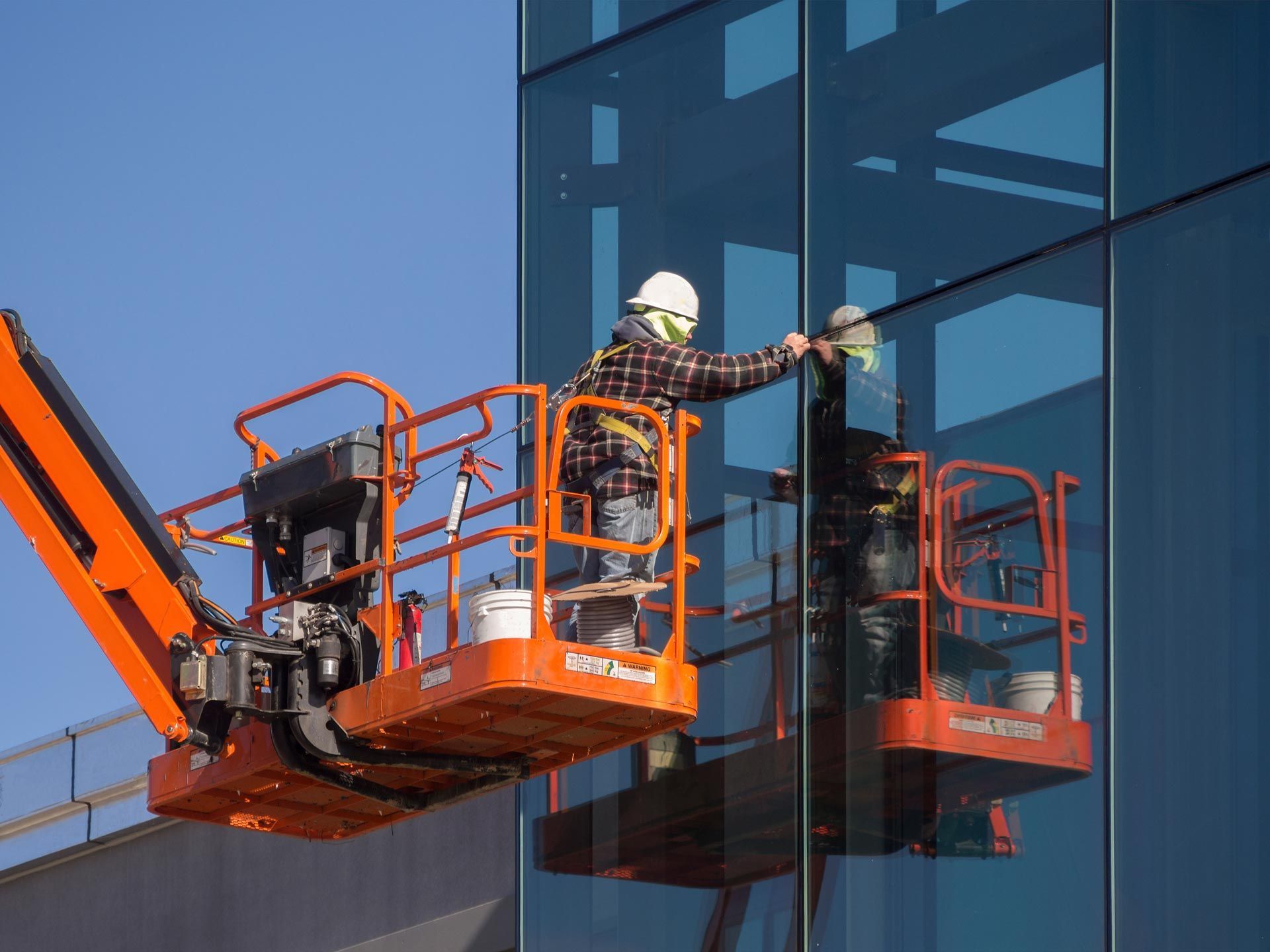 Window installer on a commercial building.