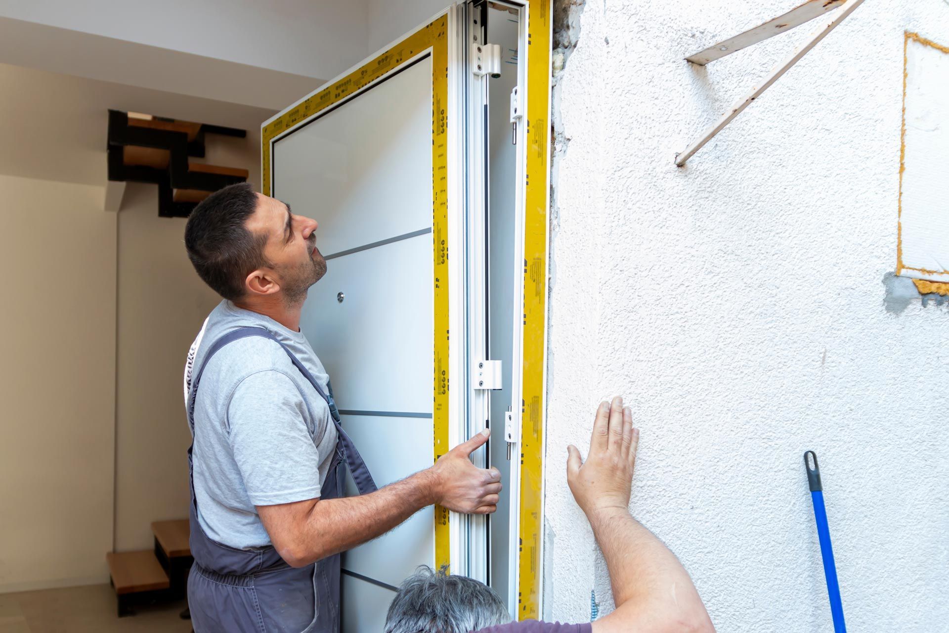 A door installation contractor replaced an old one with a new one