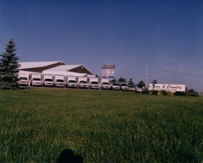 Row of Trucks — Waterloo, IA — Town & Country Home Improvement