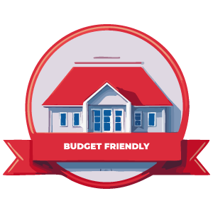 White house with red roof in a red-framed circle with a red ribbon that says 