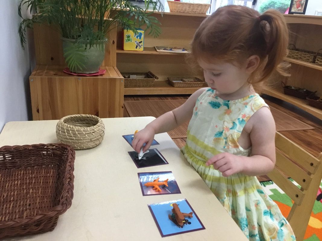 Child working with montessori materials