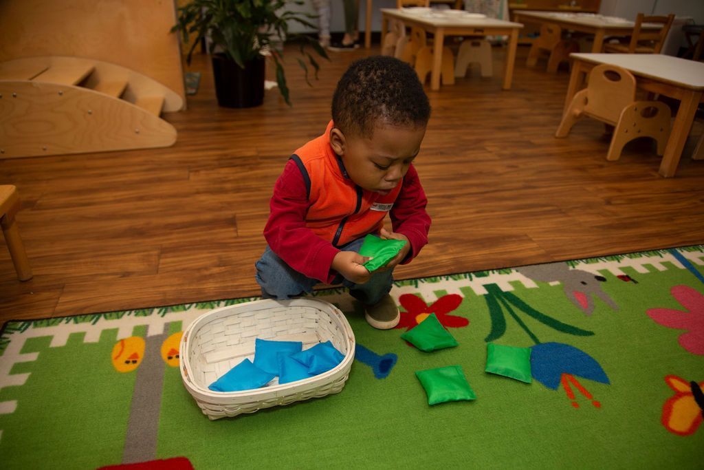 Child working with Montessori materials