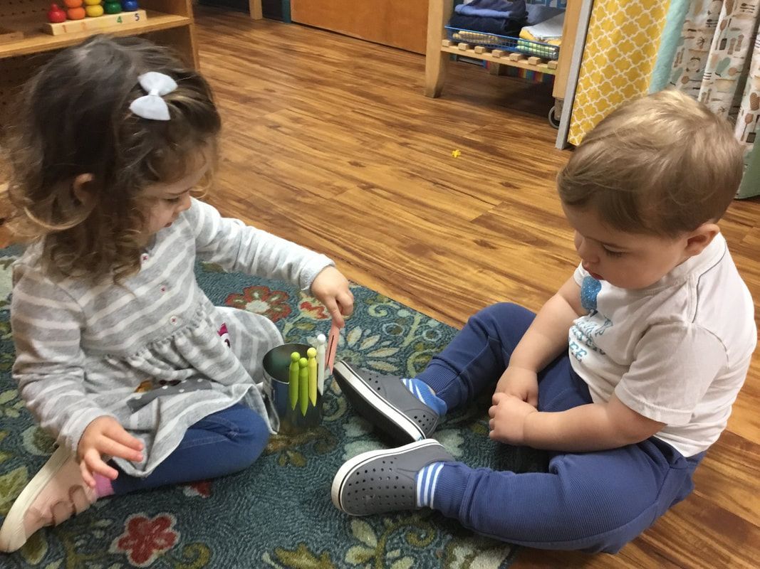 Montessori children workin together