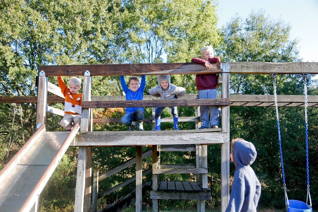 Montessori children playing in the farm's playground