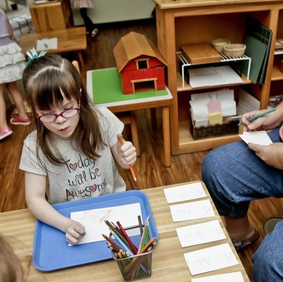 Montessori child working on language activities