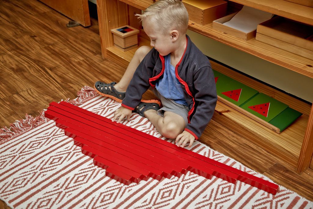 Montessori child working in the classroom