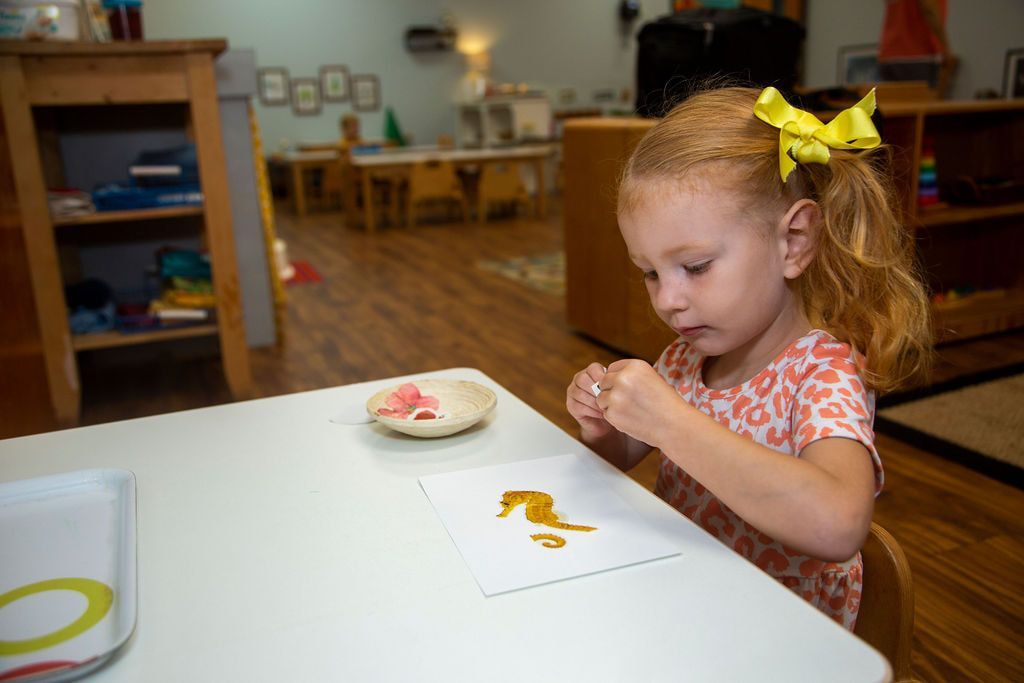 Montessori child painting