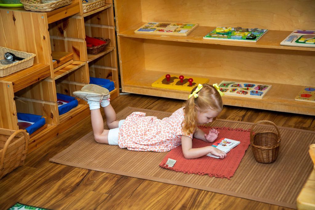 Montessori child reading