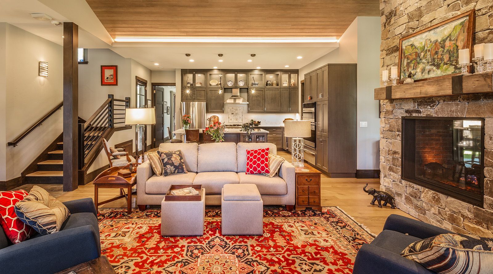 A living room filled with furniture and a fireplace.