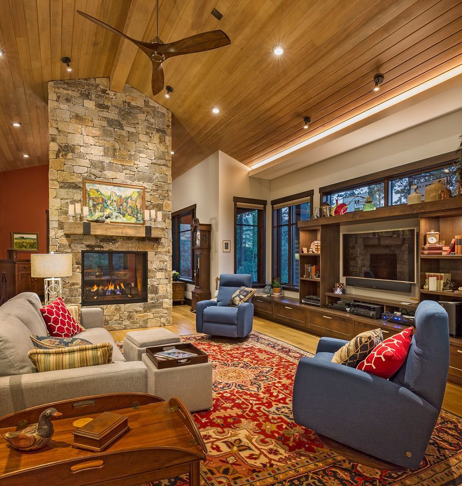 A living room filled with furniture and a fireplace