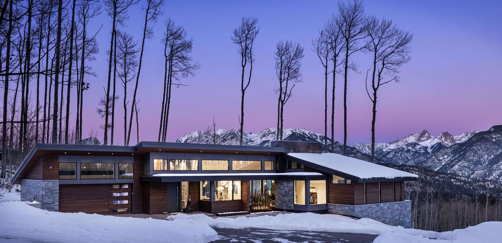 A living room filled with furniture and a fireplace.