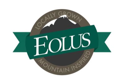 A logo for eolus that says locally grown mountain inspired