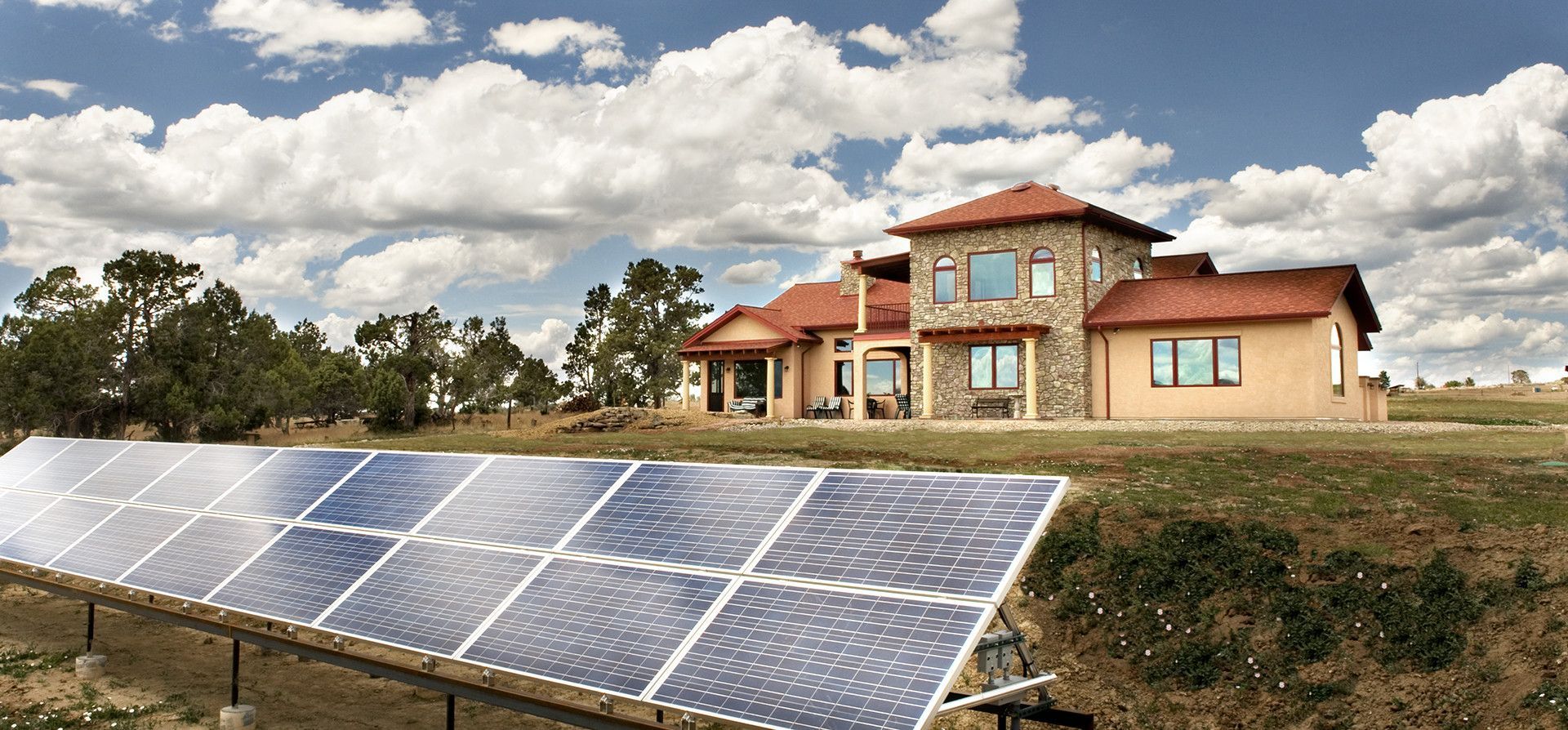 A house with a lot of solar panels in front of it