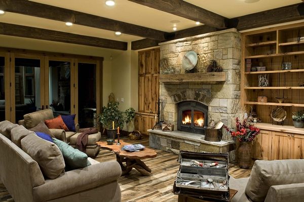 A living room with a fireplace and a couch