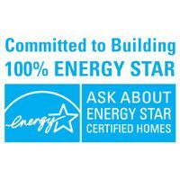 A blue sign that says `` committed to building 100 % energy star ask about energy star certified homes ''.