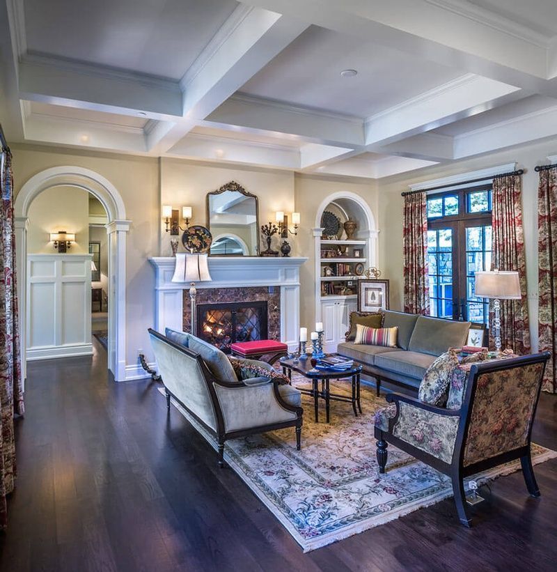 A living room filled with furniture and a fireplace