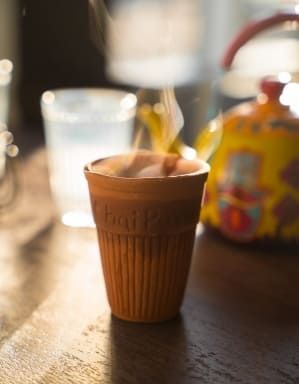 a cup with the word chai on it