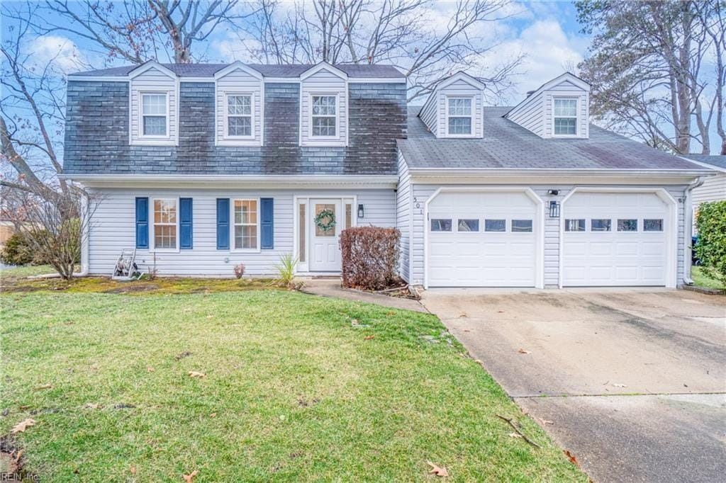 A white house with a black roof and blue shutters is for sale.
