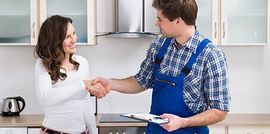Woman Shaking Hands To Plumber - plumbing service in Cape Coral, FL