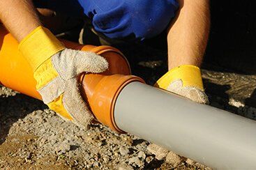 Installing Sewer Pipe - sewer and drain cleaning in Cape Coral, FL