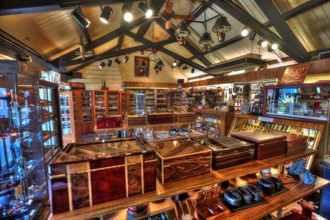 A store filled with lots of wooden boxes and shelves.