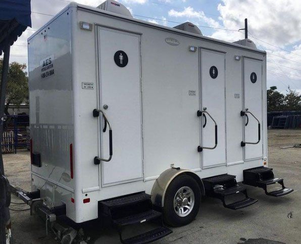 White Event Trailer Toilets — Miami, FL — A.E.S. Portable Sanitation, Inc.
