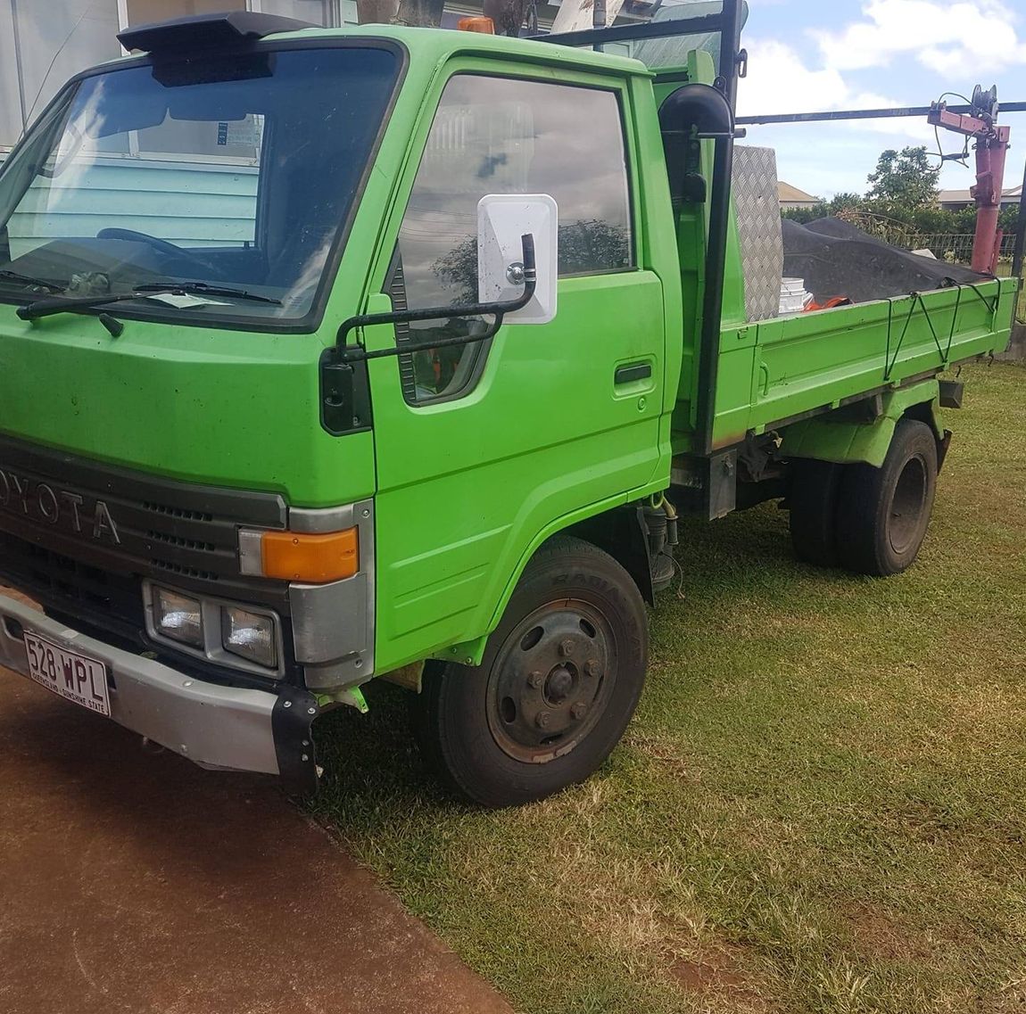 Green Truck — Fencing Contractor in Innes Park, QLD