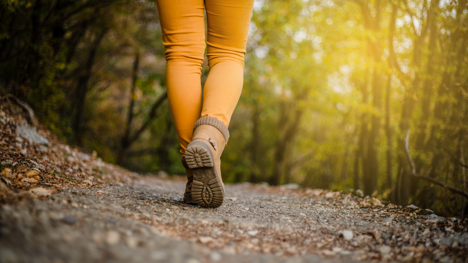 Woman walking on nature trail