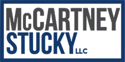 McCartney Stucky LLC logo in a blue box, with gray text on a white background.