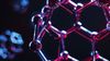 A 3D molecular structure with glowing red and blue highlights against a dark, blurry background.