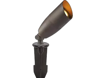 A brown spotlight is sitting on top of a white surface.