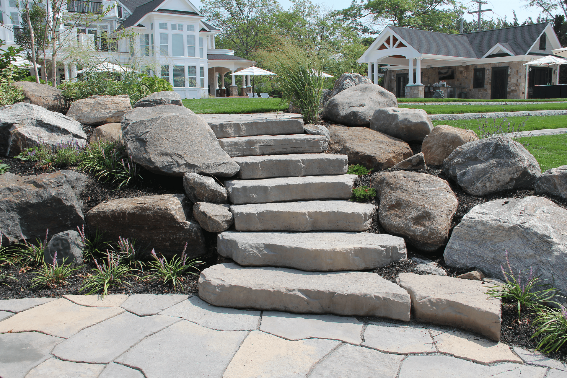 A set of stone stairs leading up to a house