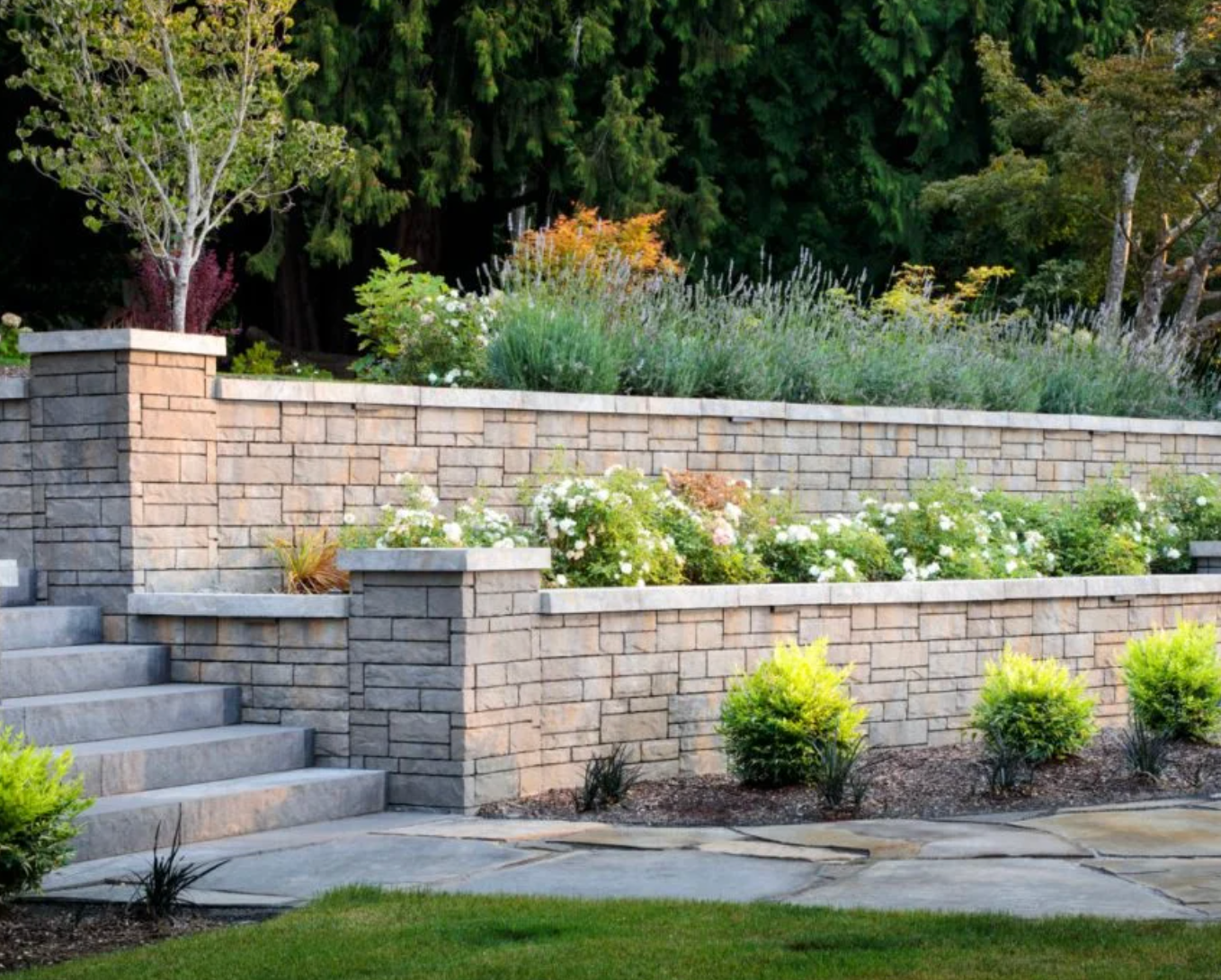 A stone wall with steps leading up to it