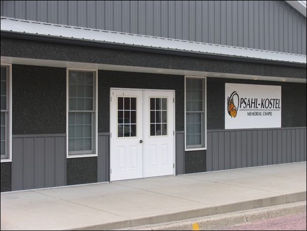 A building with a sign that says psi-he-kostel