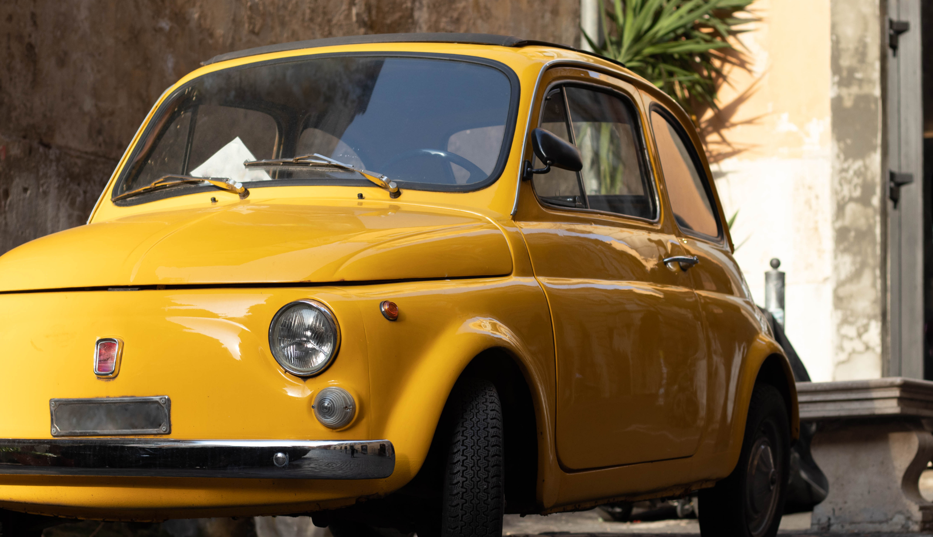 Yellow Italian Car parked in a Vineyard