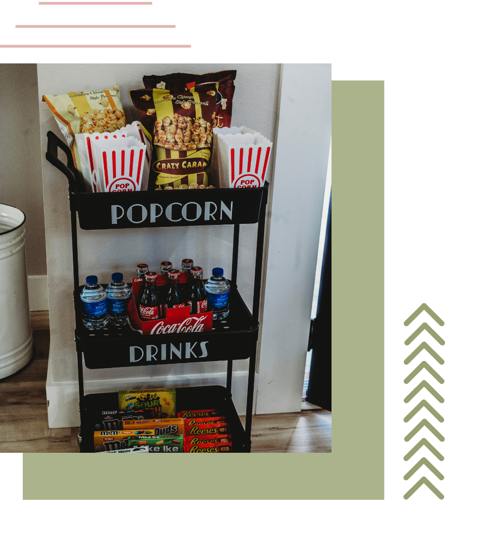 a shelf with popcorn and drinks on it | indoor tents