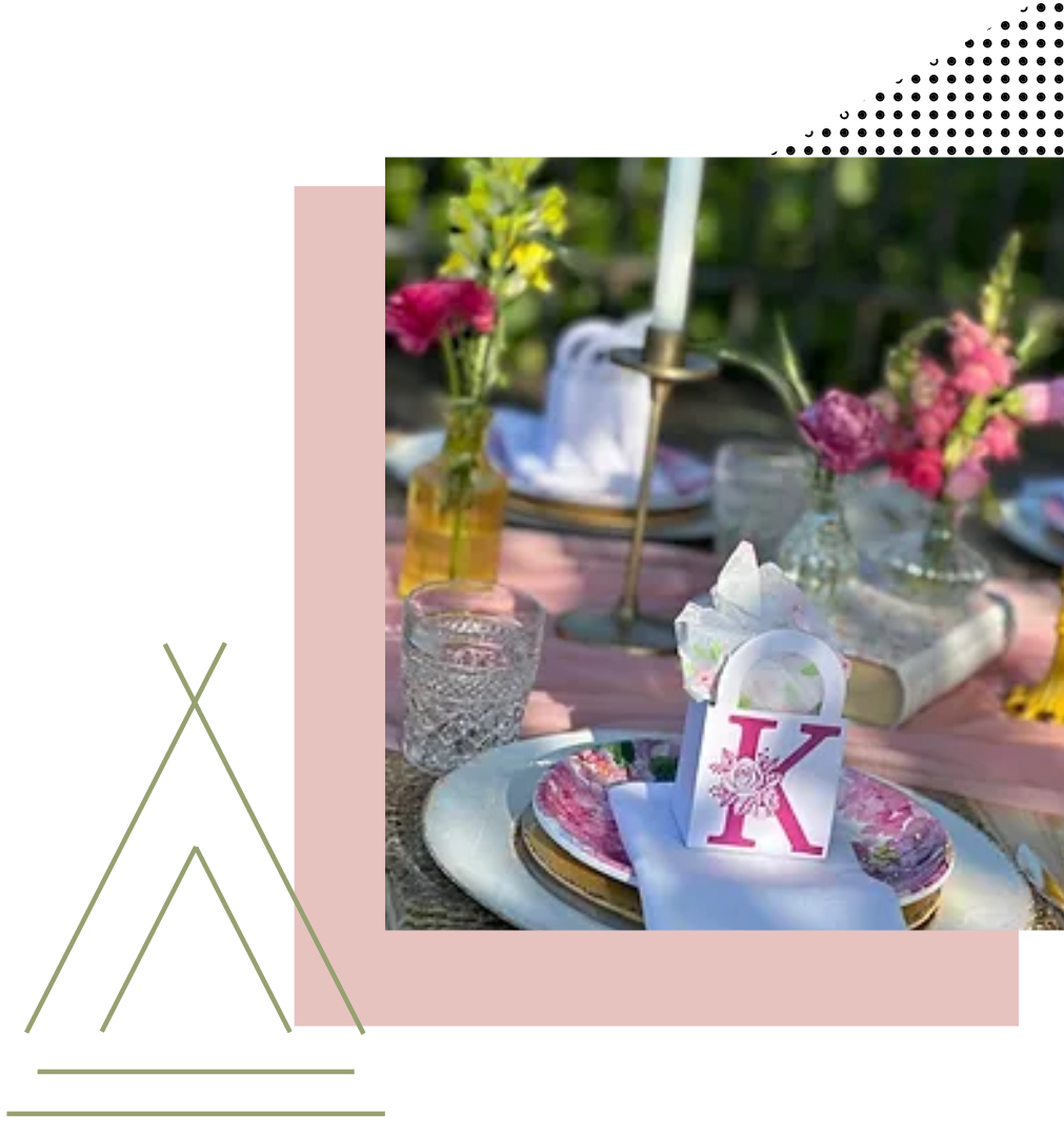 a table with plates and a mug with the letter k on it | large white tents for rent
