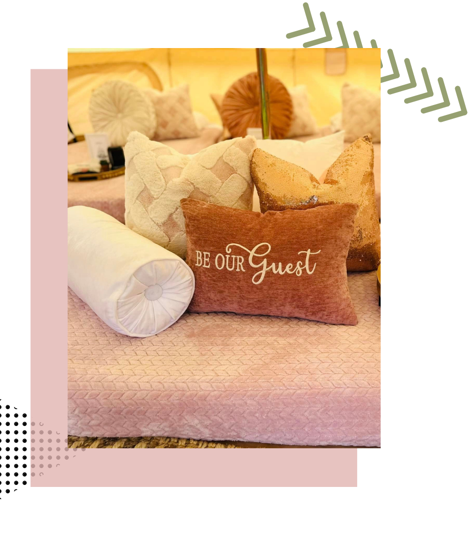 a bed with a pillow that says be our guest on it | event rentals