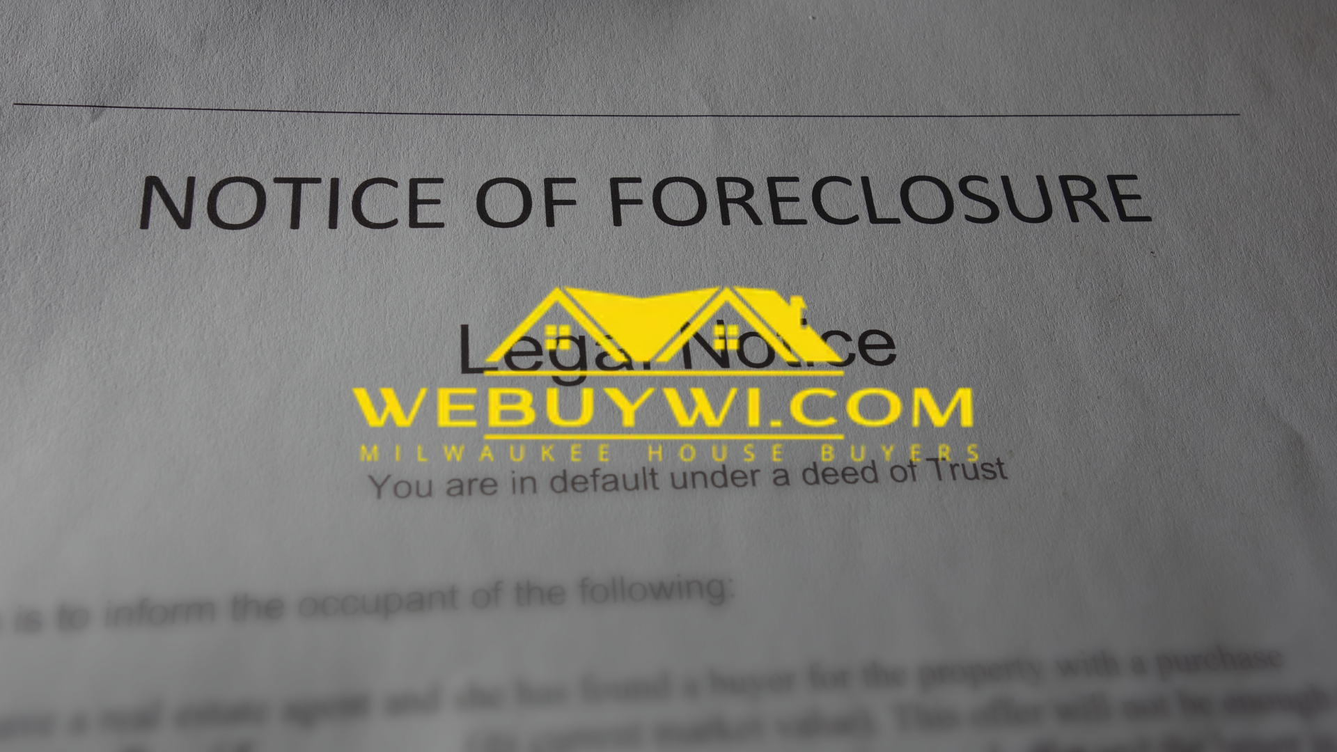 A close up of a notice of foreclosure from webbuywi.com