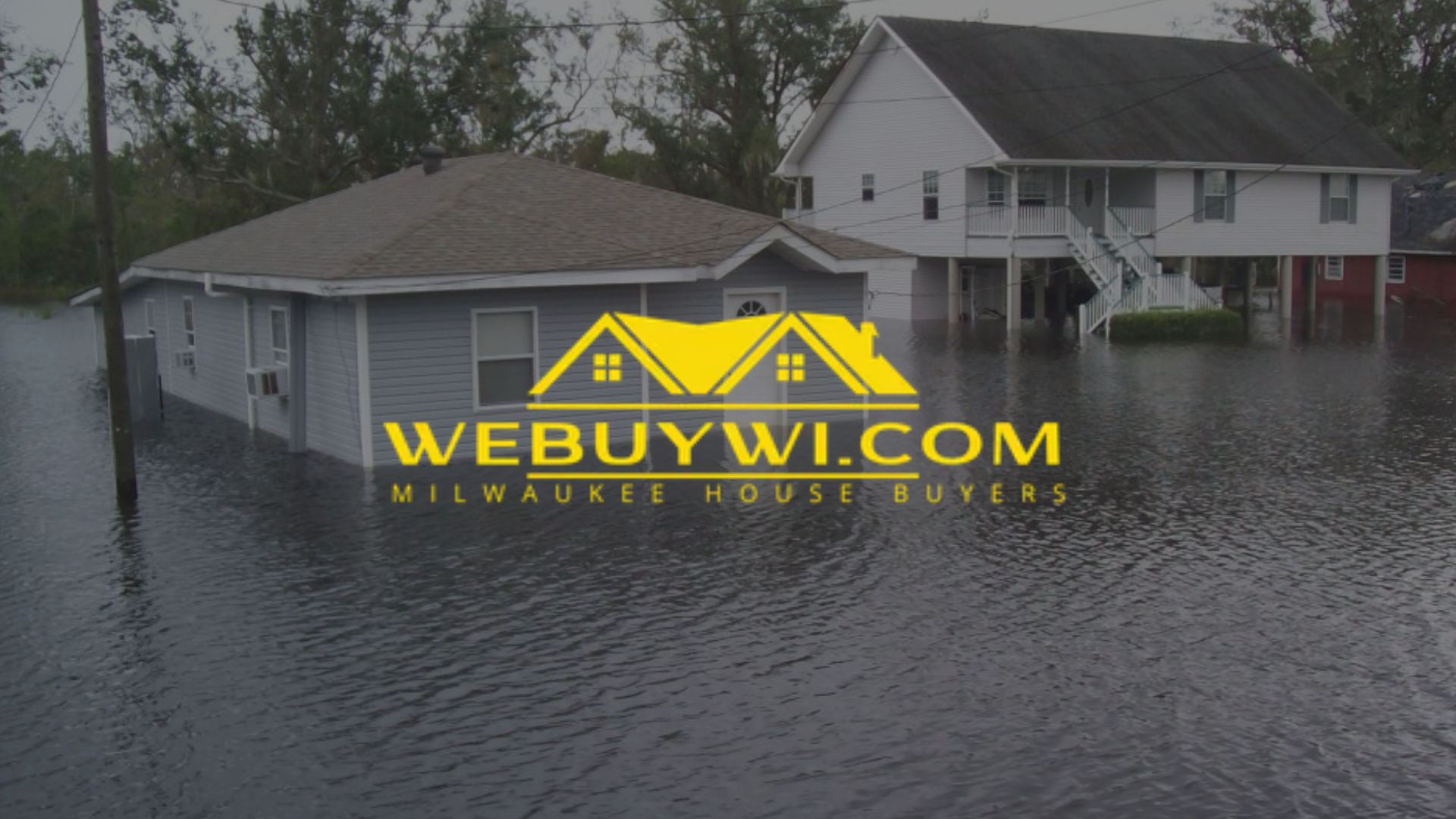 Houses submerged in floodwater; a real estate logo is overlaid.