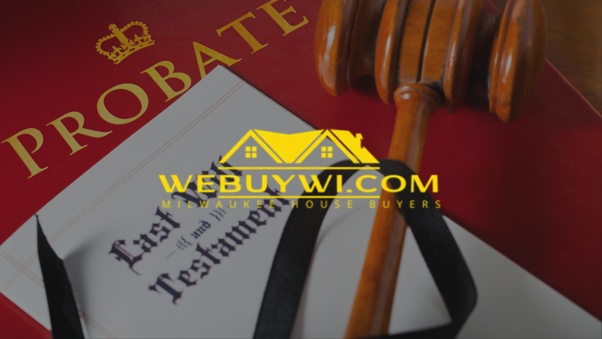 A gavel rests on a red book, with the word