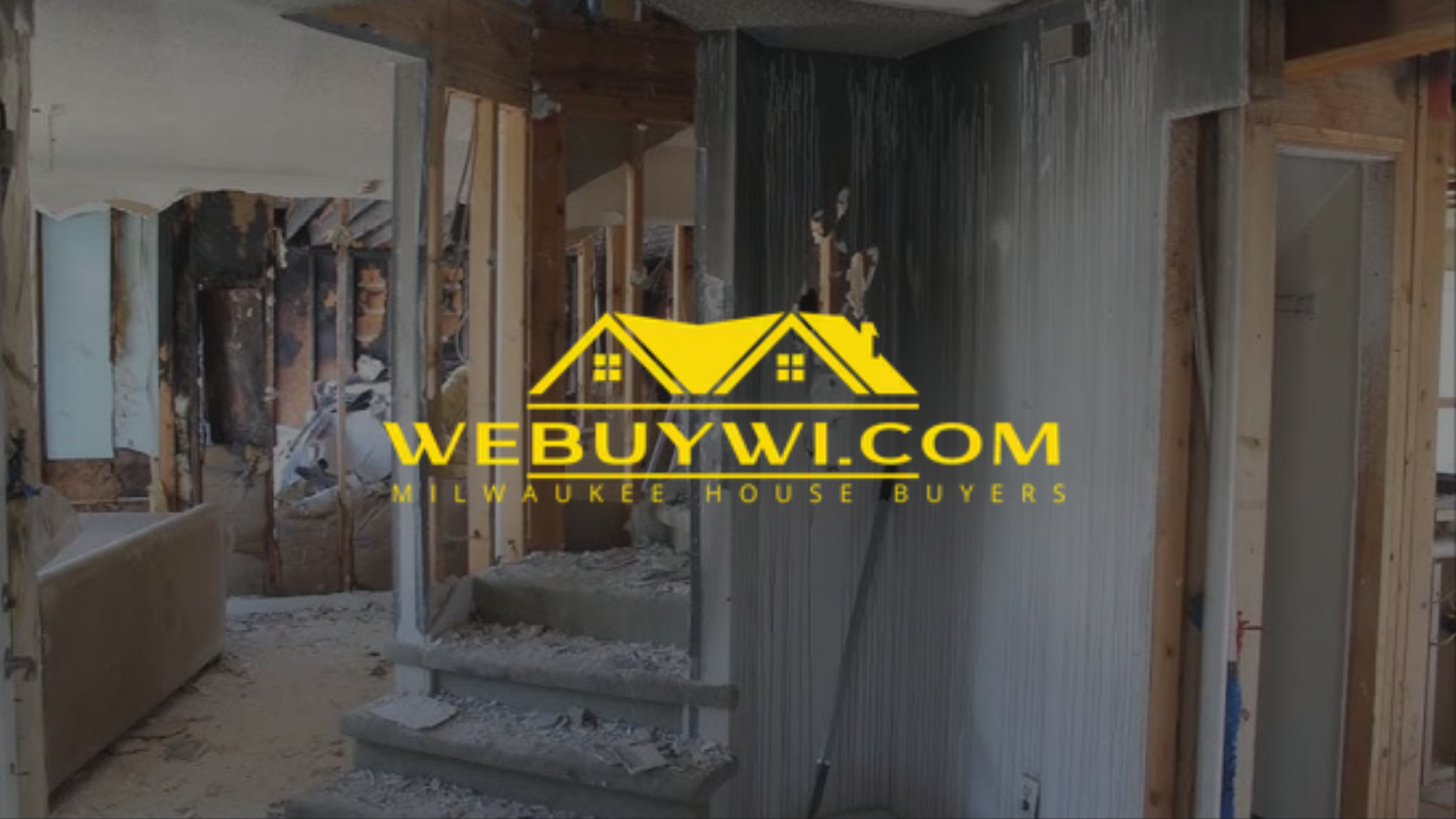 interior of a fire damaged house in franklin wi with webuywi.com logo on top