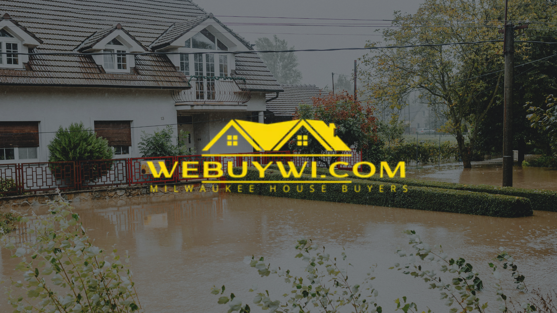 A flooded house with the website webuywi.com on the bottom symbolizing water damage in oak creek wi with webuywi.com logo on top