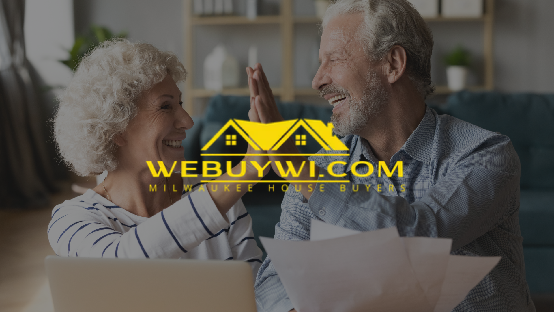Older couple high-fiving over documents; WeBuyWI.com logo superimposed.