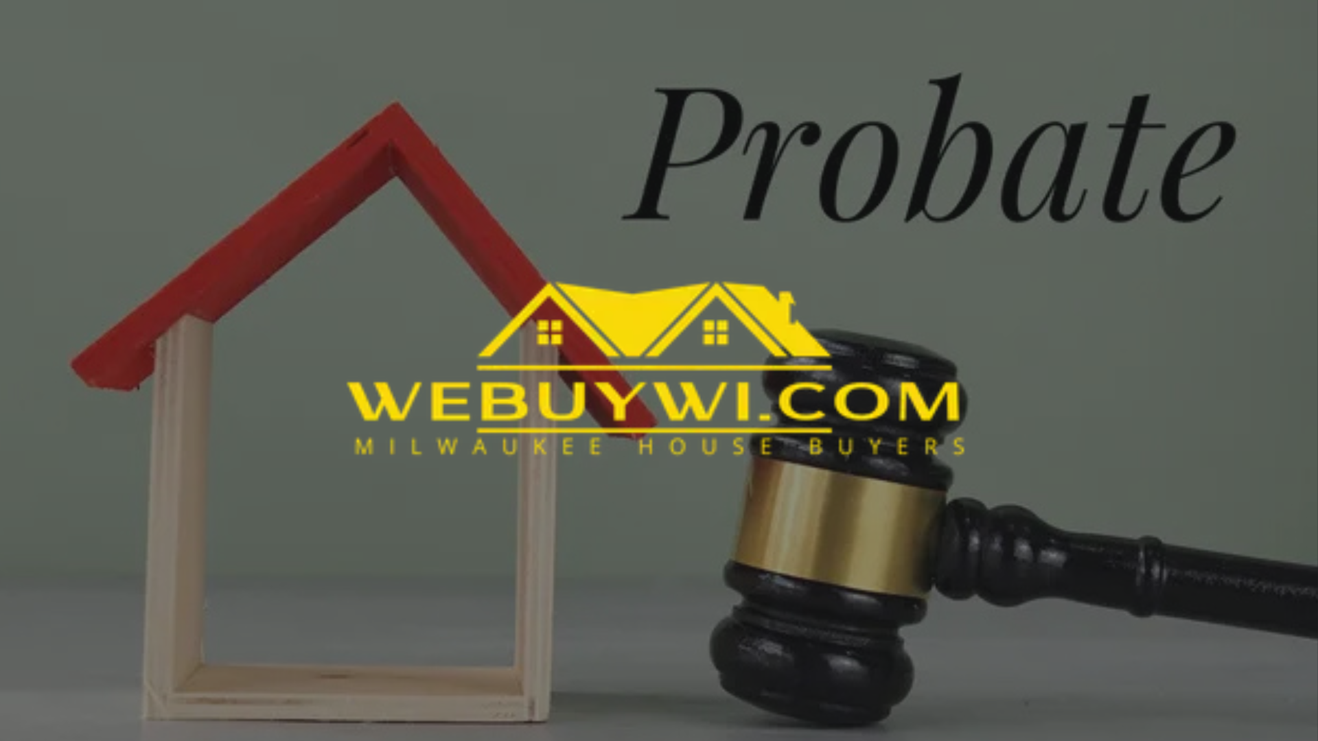 Wooden house frame, gavel, and the word 