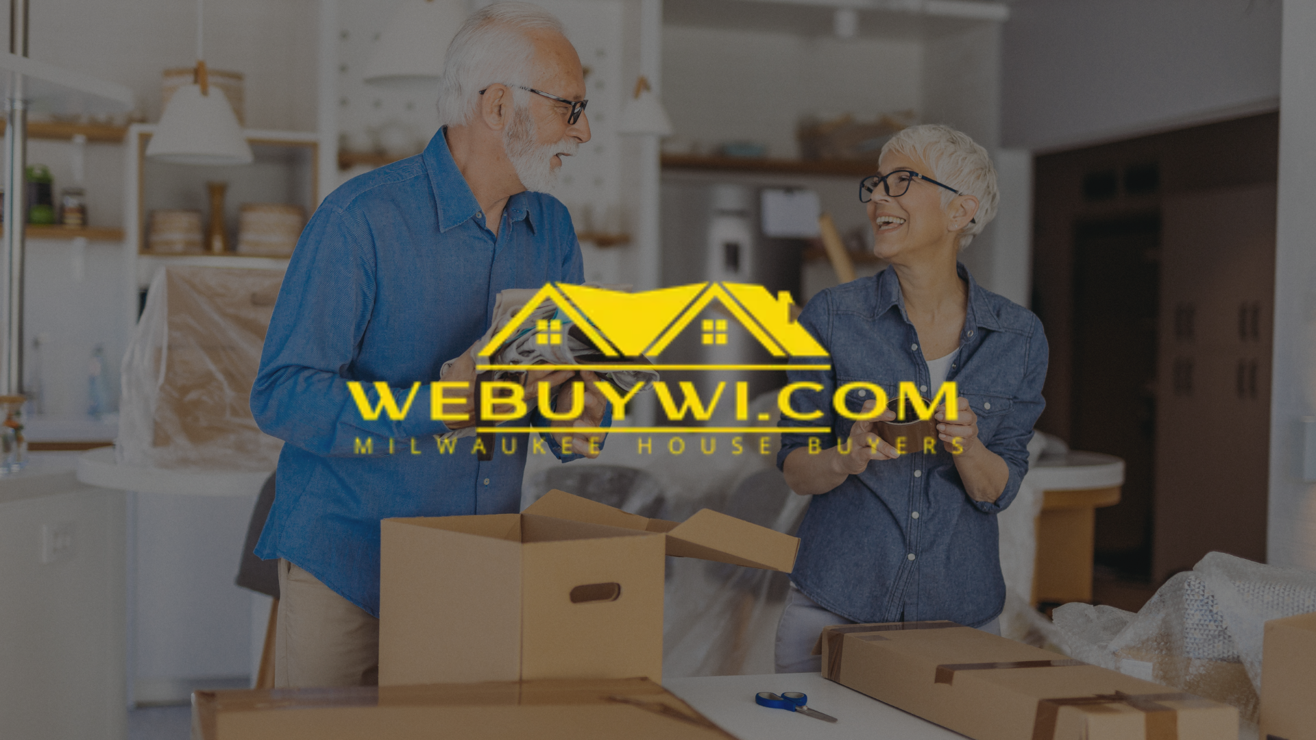 An older couple packing moving boxes. Logo of a house with 